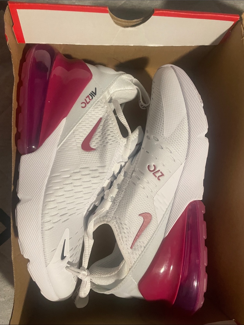 Nike women’s Athletic Shoes in White with Pink Accents